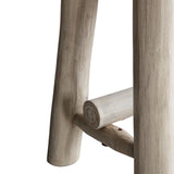 Rustic solid wood farmhouse bench with natural finish and round legs close up