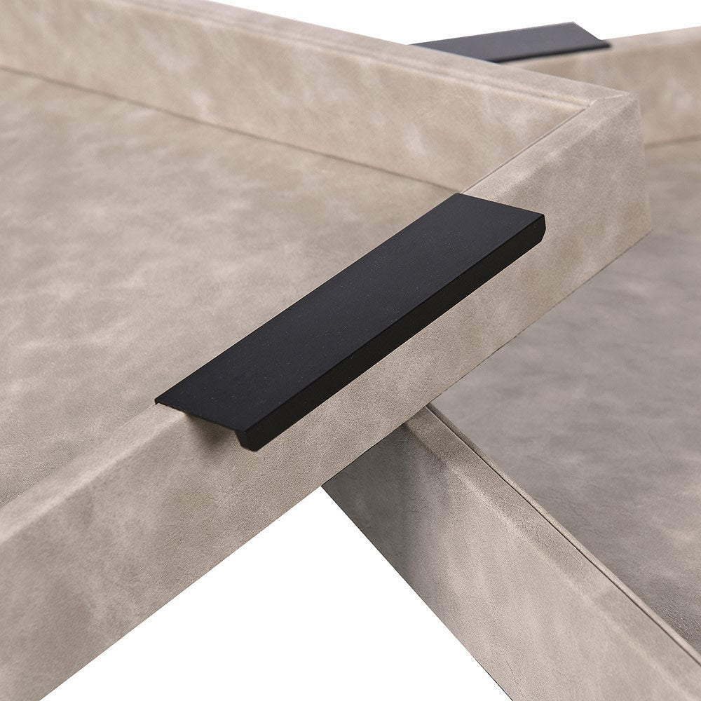 Close up of faux leather tray with black handle detail