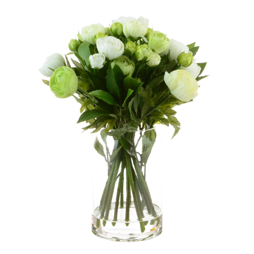 Faux white and green Ranunculus bouquet arranged in a clear glass vase with lifelike foliage