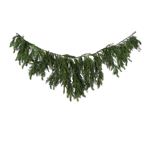 Faux cedar fireplace swag garland with realistic evergreen branches draped in a natural shape