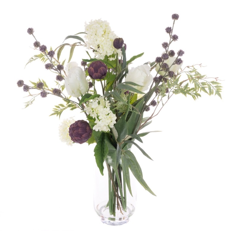 Faux tulip and artichoke floral arrangement in a clear glass vase with viburnum thistles and eucalyptus foliage