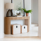 Fisherman cage table lamp on console table by staircase