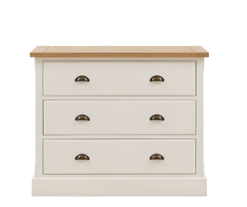 Florence 3 drawer chest of drawers in oak and white beside a bed with mirror and decor