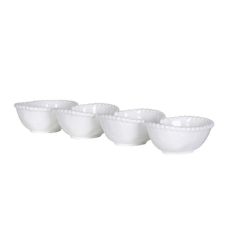 Four joined white ceramic bowls with raised pearl beaded rims
