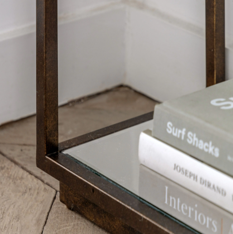 Geneva Glass Console Table with clear glass shelves and modern metal frame in hallway