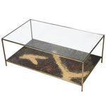 Indulge in the opulence of the Gianna Elegant Glass and Brass Console Table, a luxurious addition to any elegant space. The base of this elegant side table features a stunning oxidized finish.