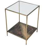 Indulge in the opulence of the Gianna Elegant Glass and Brass Side Table, a luxurious addition to any elegant space. The base of this elegant side table features a stunning oxidized finish.