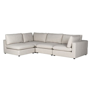A light beige upholstered sectional sofa with a left-facing chaise and a right-facing armrest, shown against a plain white background.