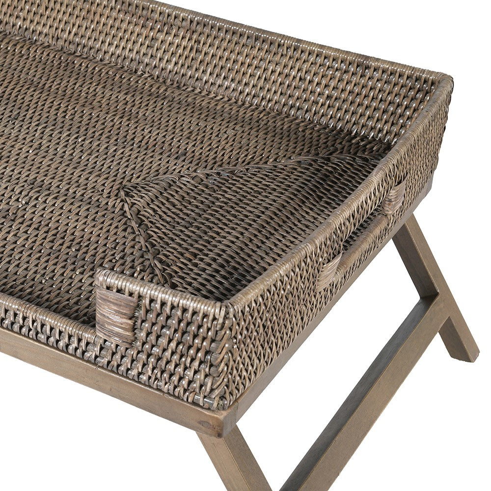 Close up of woven rattan tray with natural texture and wooden frame