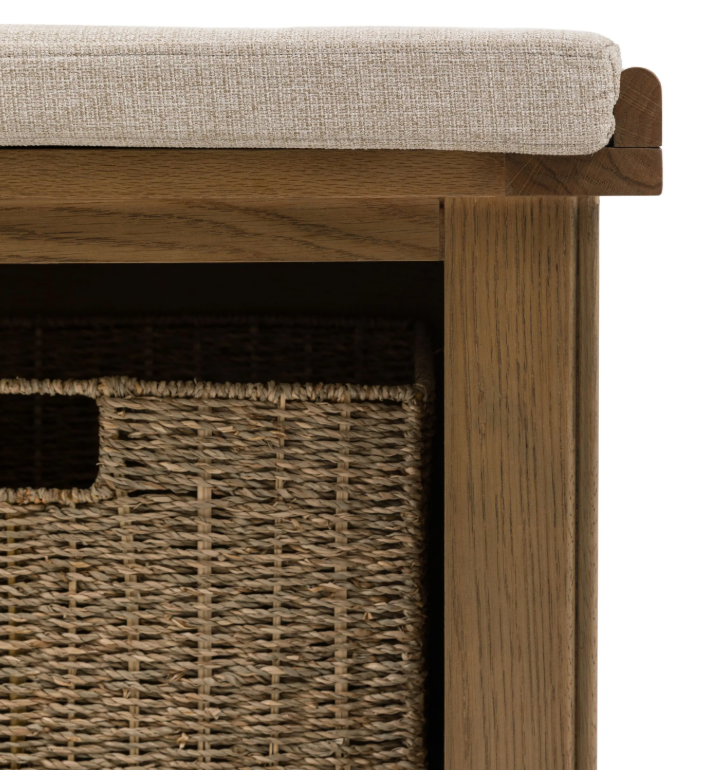 Hardwick Hall Bench made from oak and oak veneer with a cushioned seat and three seagrass storage baskets