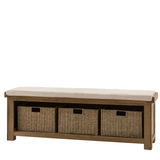 Hardwick Hall Bench made from oak and oak veneer with a cushioned seat and three seagrass storage baskets
