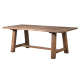 Reclaimed elm wood dining table with trestle base and rustic finish