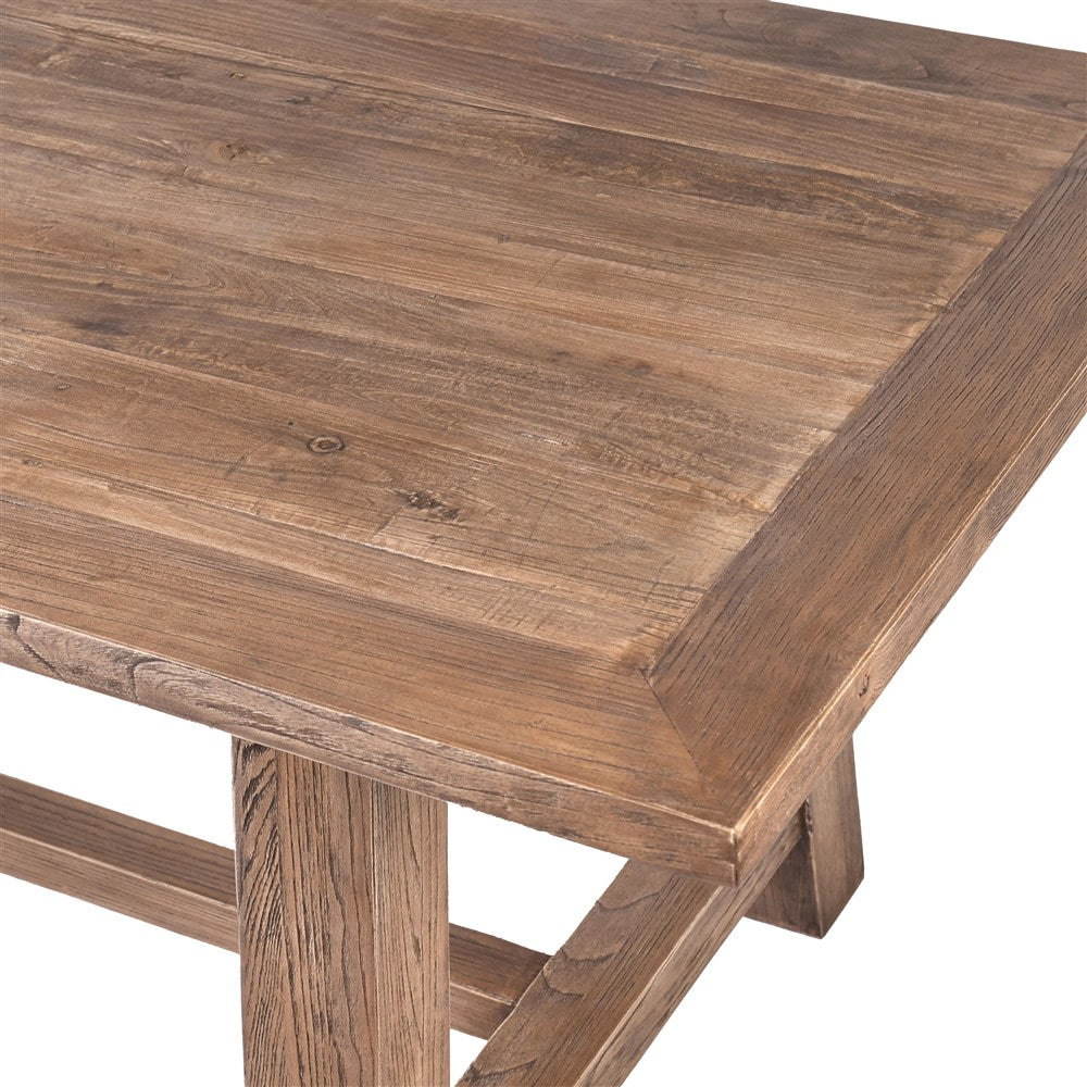 Reclaimed elm wood dining table with trestle base and rustic finish