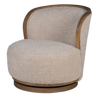 Holkham swivel chair viewed from the front, showing the cream bouclé upholstery, round deep seat cushion and curved oak-toned wood hoop frame