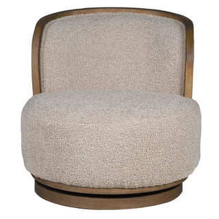Holkham swivel chair viewed from the front, showing the cream bouclé upholstery, round deep seat cushion and curved oak-toned wood hoop frame