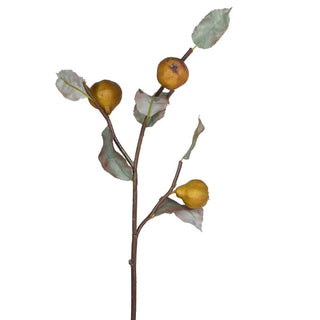 Faux quince stem styled in a vase as part of a seasonal arrangement