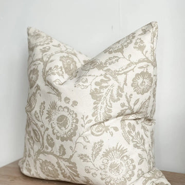 A stunning cotton cushion with a beautiful floral print detailing.