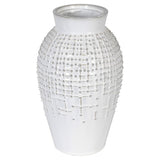 Close up of the vase showing an irregular pattern of raised bumps and lines