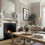 A stunning floor lamp in black featuring a beautiful turned base complete with off white linen shade.