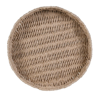 A round woven tray made from natural beige seagrass or wicker, shown from a top-down perspective on a solid white background.