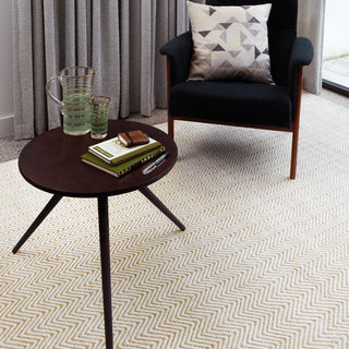 Ives jute and cotton flatweave rug in natural styled in a living room