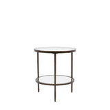 Jenner bronze glass side table with two tier round glass shelves beside a sofa in a modern interior