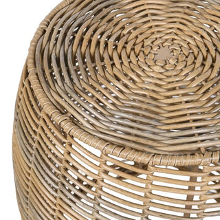 Close-up of a round woven rattan stool base, showing the natural tan and light brown wicker texture against a white background.