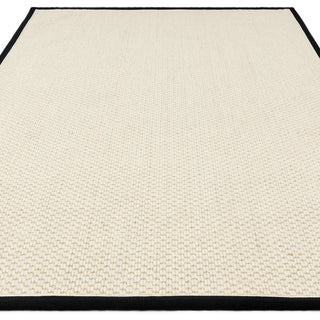 Korra Double Loop rug in charcoal and cream, detail of the woven border