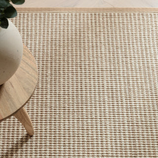 Close-up of the loop texture on the Korra Loop rug in linen and cream