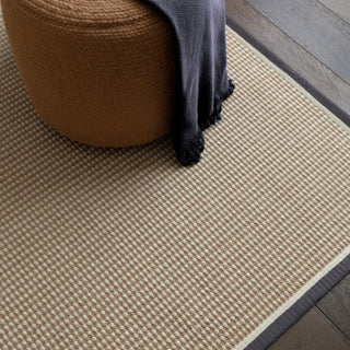 Close-up of the loop texture on the Korra Loop rug in slate and cream