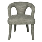 Indulge in the luxurious comfort of the Kristin Open Back Dining Chair, crafted with a woven textured fabric in a soft cream hue with subtle hints of moss green. Elevate your dining experience with this sophisticated and exclusive piece.