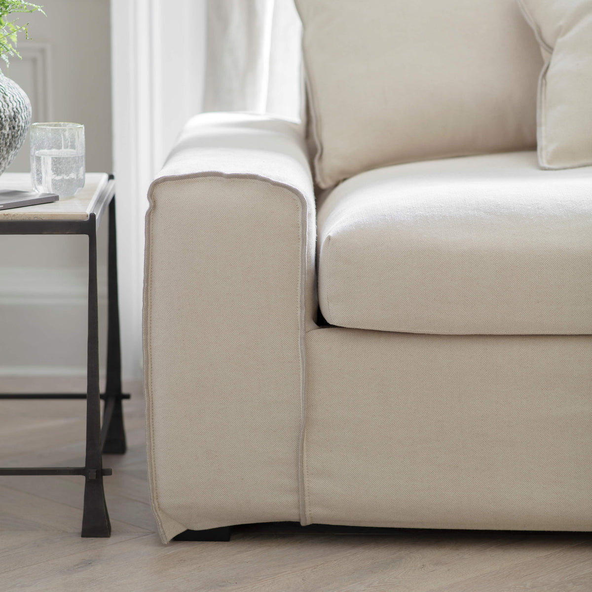 Stanway chaise sofa in oatmeal linen and cotton blend styled in a living room