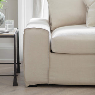 Stanway chaise sofa in oatmeal linen and cotton blend styled in a living room
