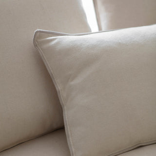 Stanway oatmeal chaise sofa front view showing scatter back cushions