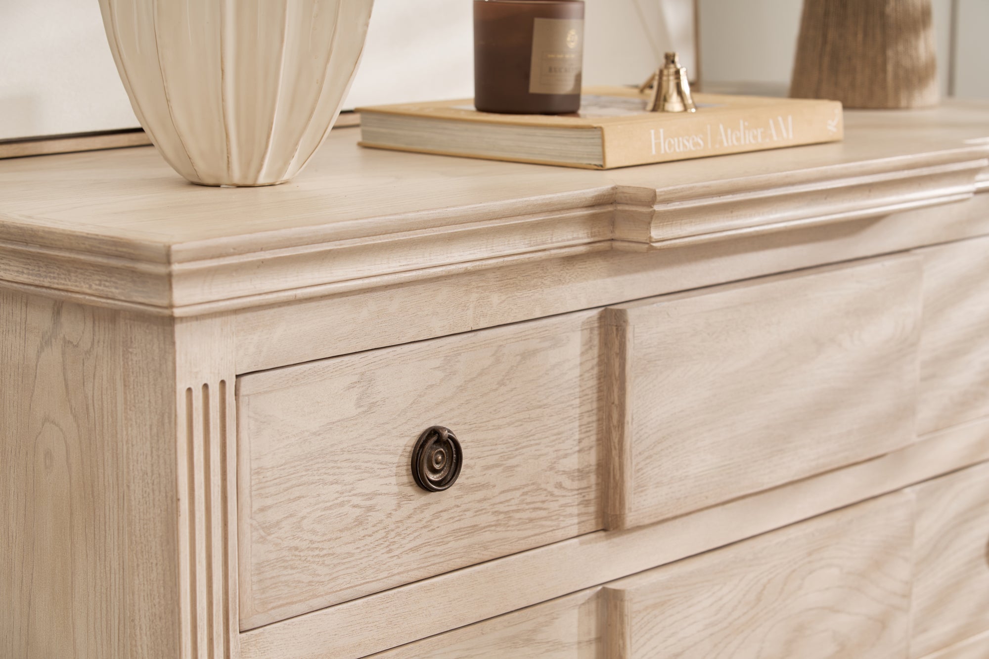 close-up of Longbourn Chest top surface styled with décor