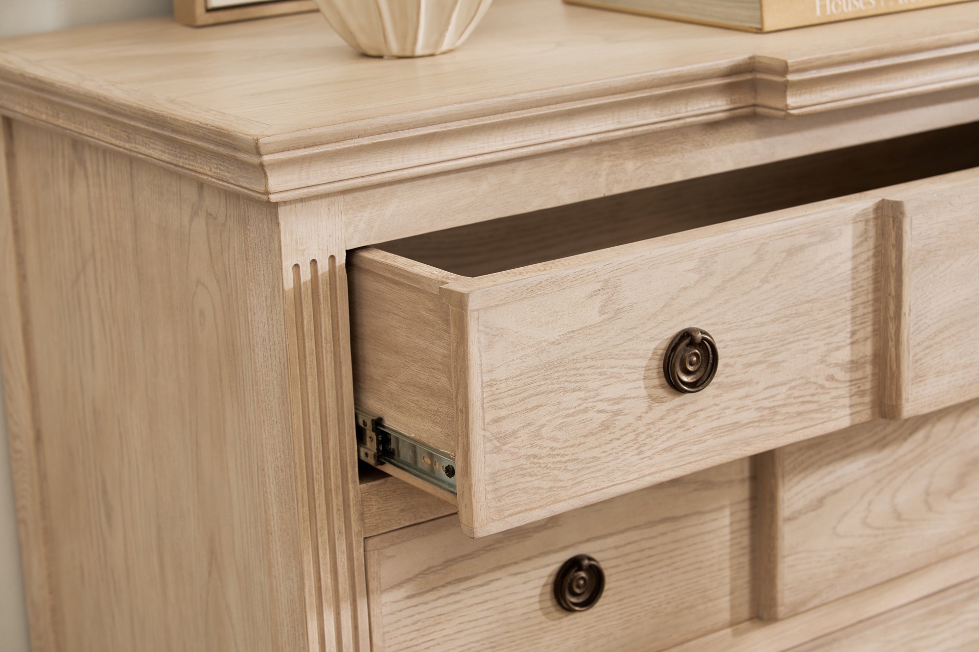 close-up of Longbourn Chest top surface styled with décor