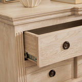 close-up of Longbourn Chest top surface styled with décor