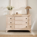 Longbourn Chest in room setting with lamp, vase, and artwork