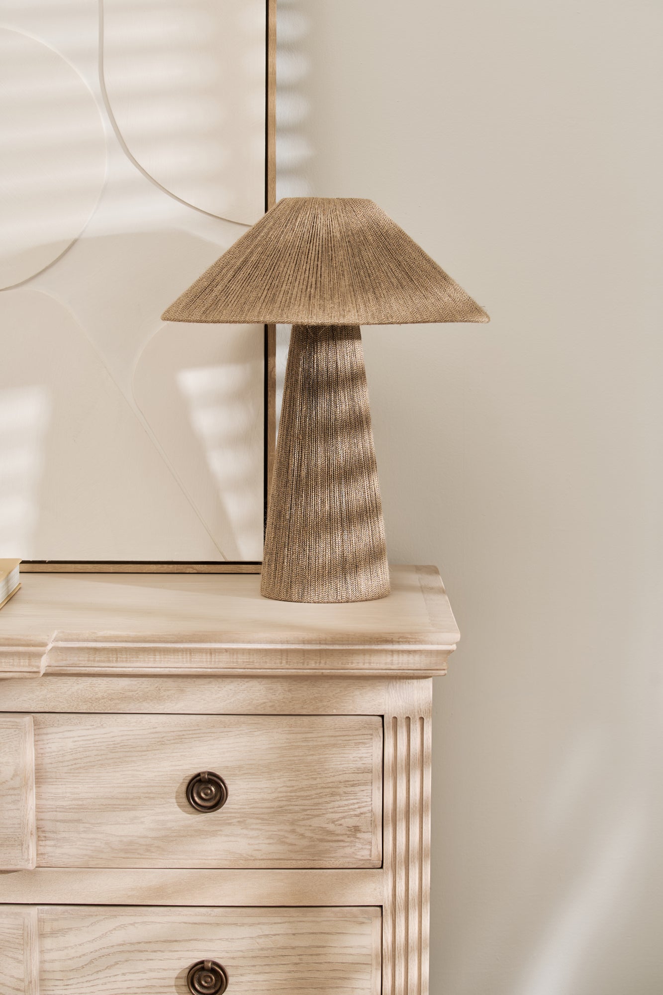 Close-up of Longbourn Chest top surface styled with décor