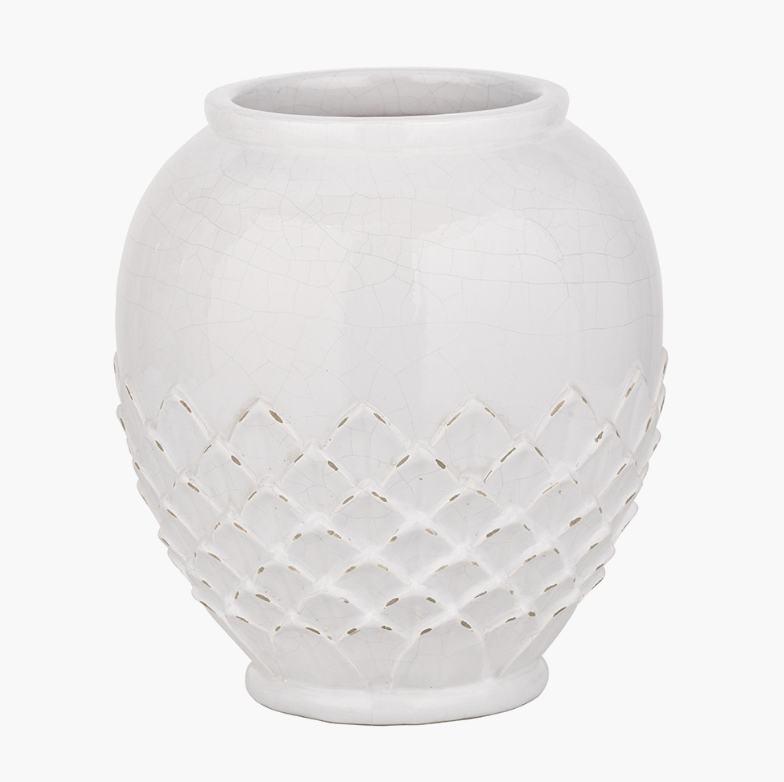 White lotus ceramic vase with woven pattern on a white background