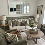 Lucia White Ceramic Table Lamp with beaded detailing and linen shade styled in living room