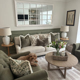 Lucia White Ceramic Table Lamp with beaded detailing and linen shade styled in living room