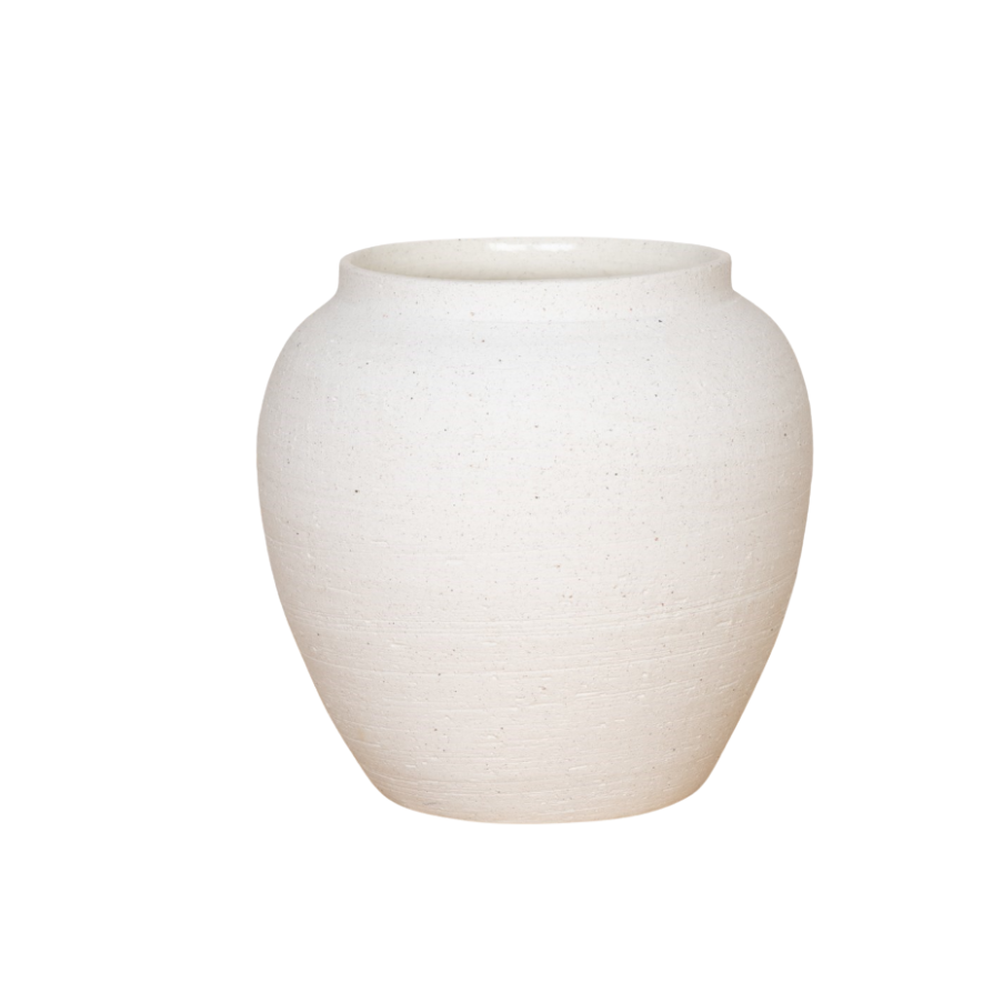 Lulu white ceramic vase with a rounded sculptural shape on a wooden surface