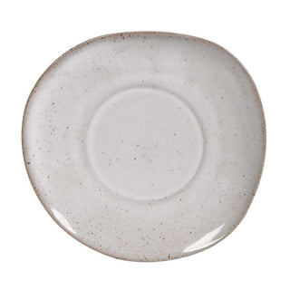 Top-down view of a Lulworth saucer, showing the subtly organic hand-finished edge and central cup well in reactive cream-white glaze