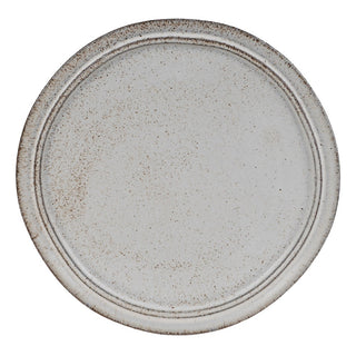 Top-down view of a single Lulworth dinner plate, showing the full reactive glaze pattern with russet edges and concentric rim detail