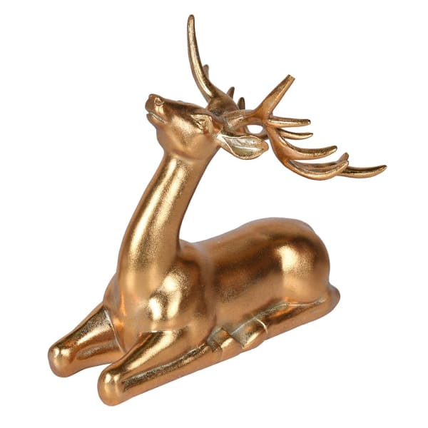 Majestic Golden Starlight Reindeer figurine laying down with detailed antlers in gold finish