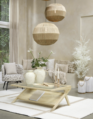 Malmo pale mango wood coffee table styled in a neutral Scandi living room with jute pendants