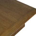 Close-up of natural oak wood grain finish on coffee table surface