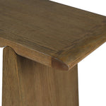 Close-up of oak wood grain and smooth finish on console table surface