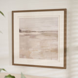 Framed abstract landscape print titled "Misty Daybreak" featuring soft gray, beige, and white tones with a minimalist design, displayed in a wood-look frame and white matting.